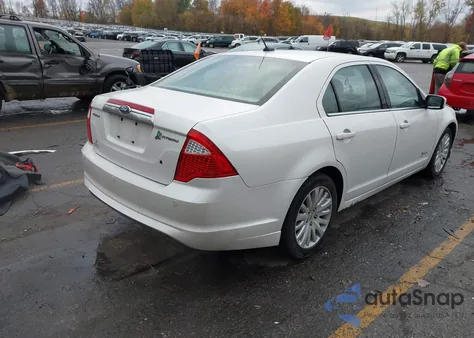 2011 Ford Fusion Hybrid z USA, uszkodzony, nr VIN 3FADP0L39BR124117